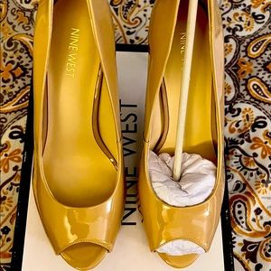 Never worn Nine West Platform Patent heels!